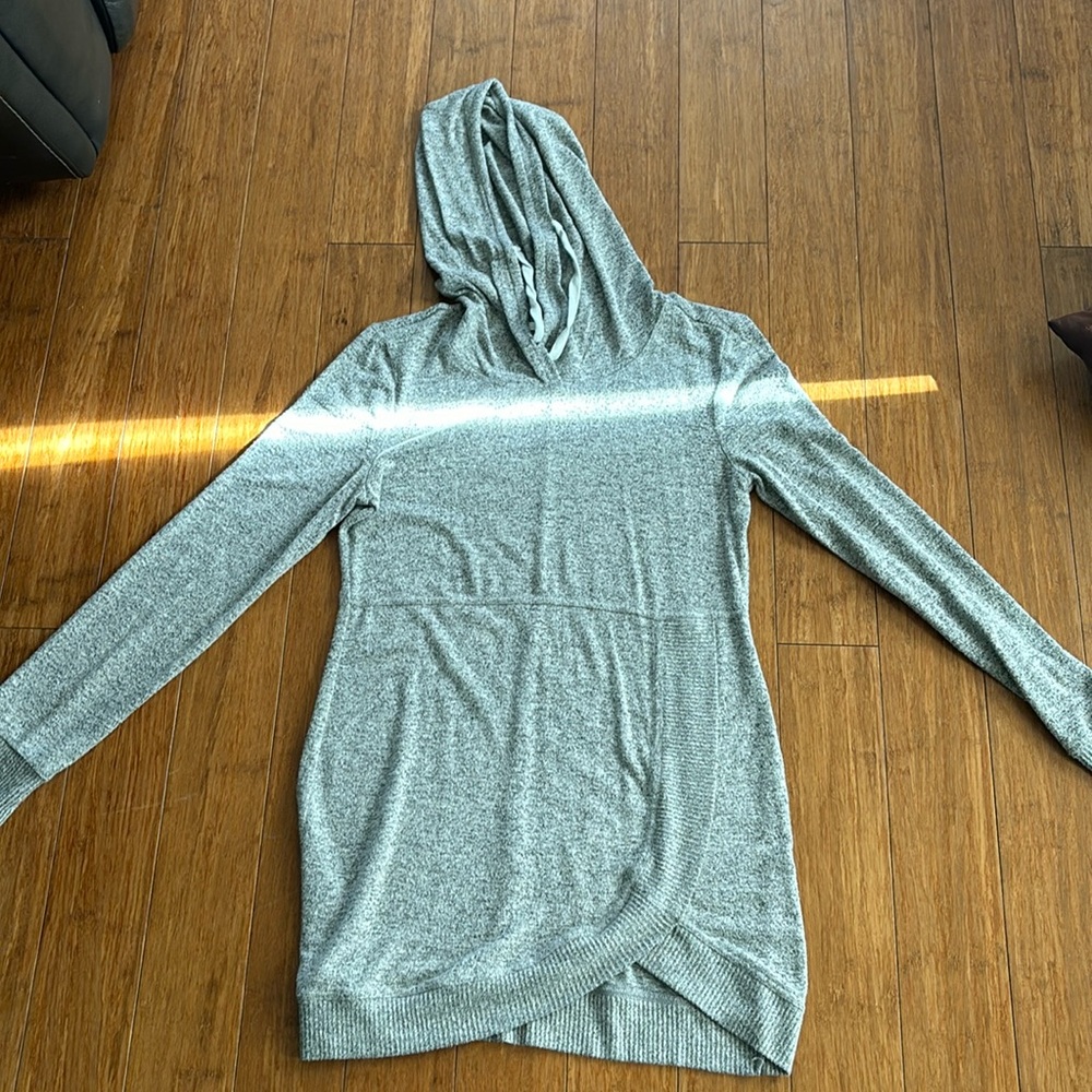 It’s a thin grey Maurice’s jacket in women’s XS.
